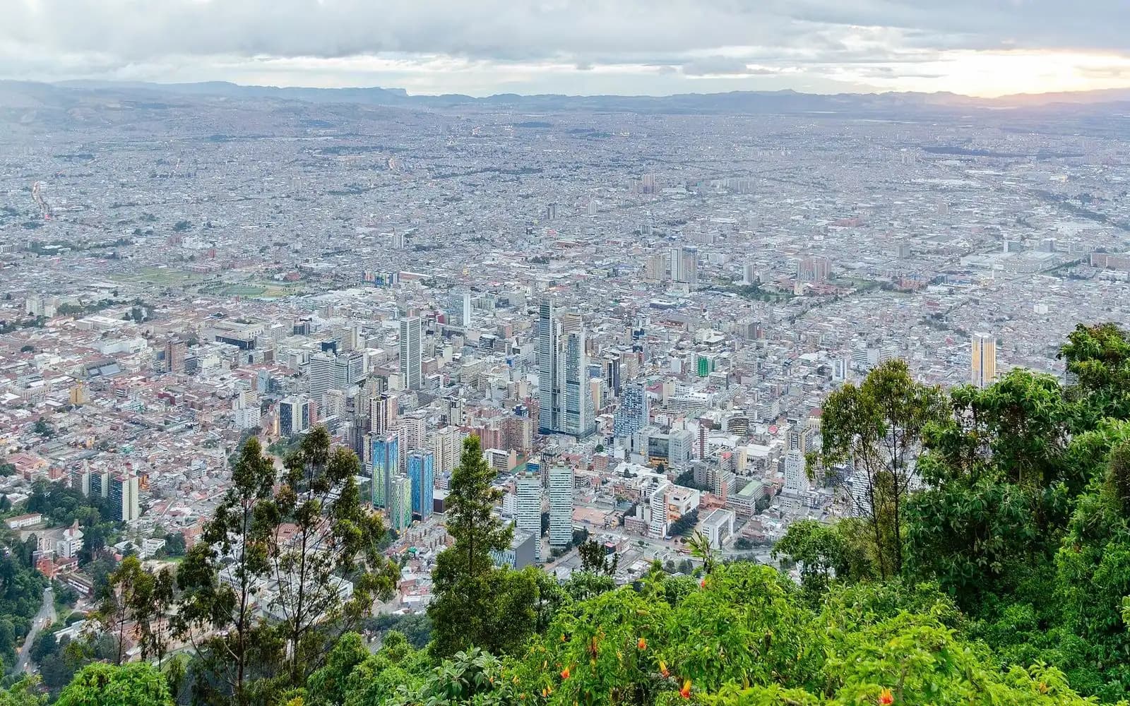 Bogotá's towers and endless rooftops stretching across the Andean plateau seen from Monserrate hill, Bogotá, Colombia