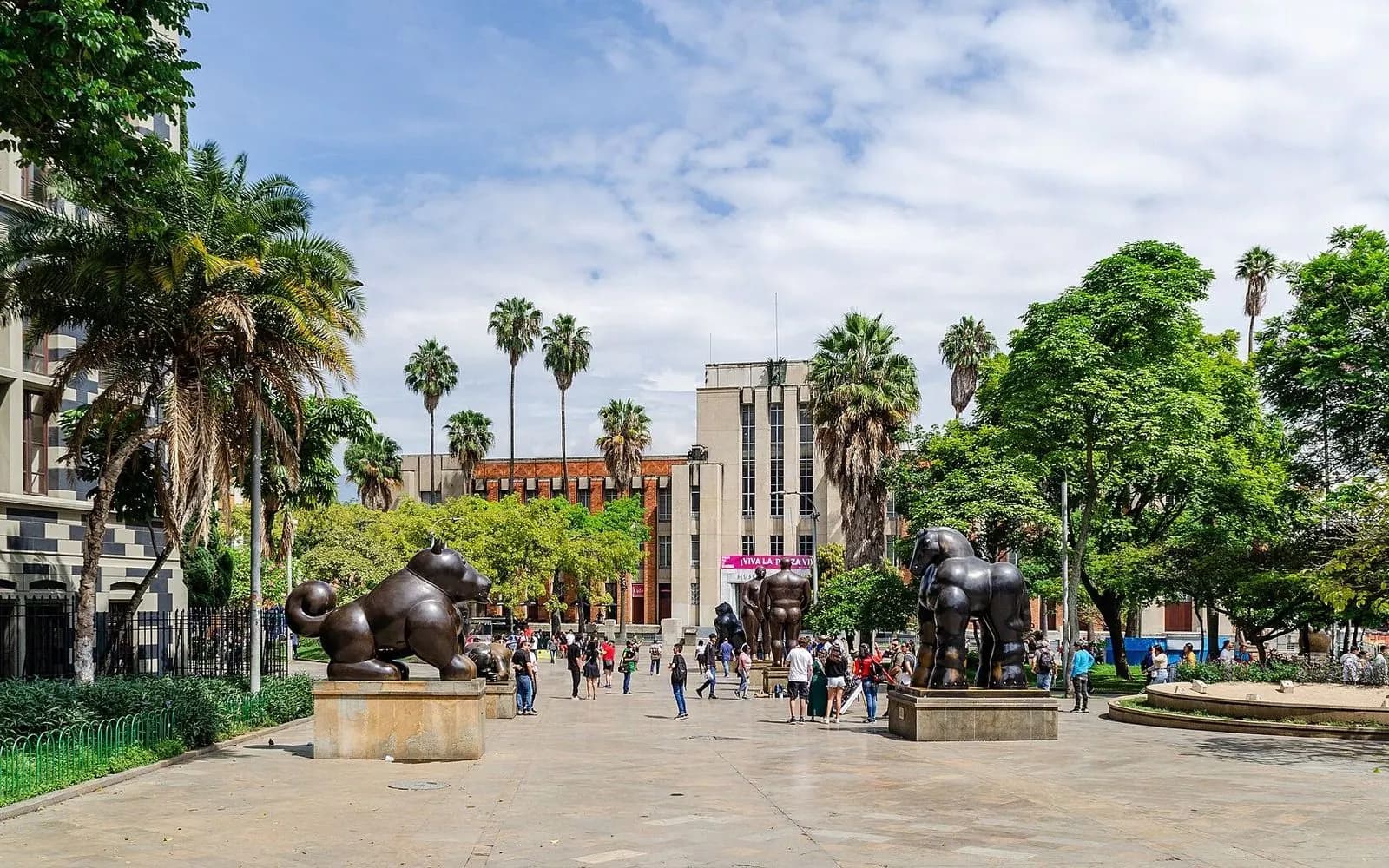 Botero's round bronze sculptures in the palm-lined Plaza Botero, Medellín, Colombia