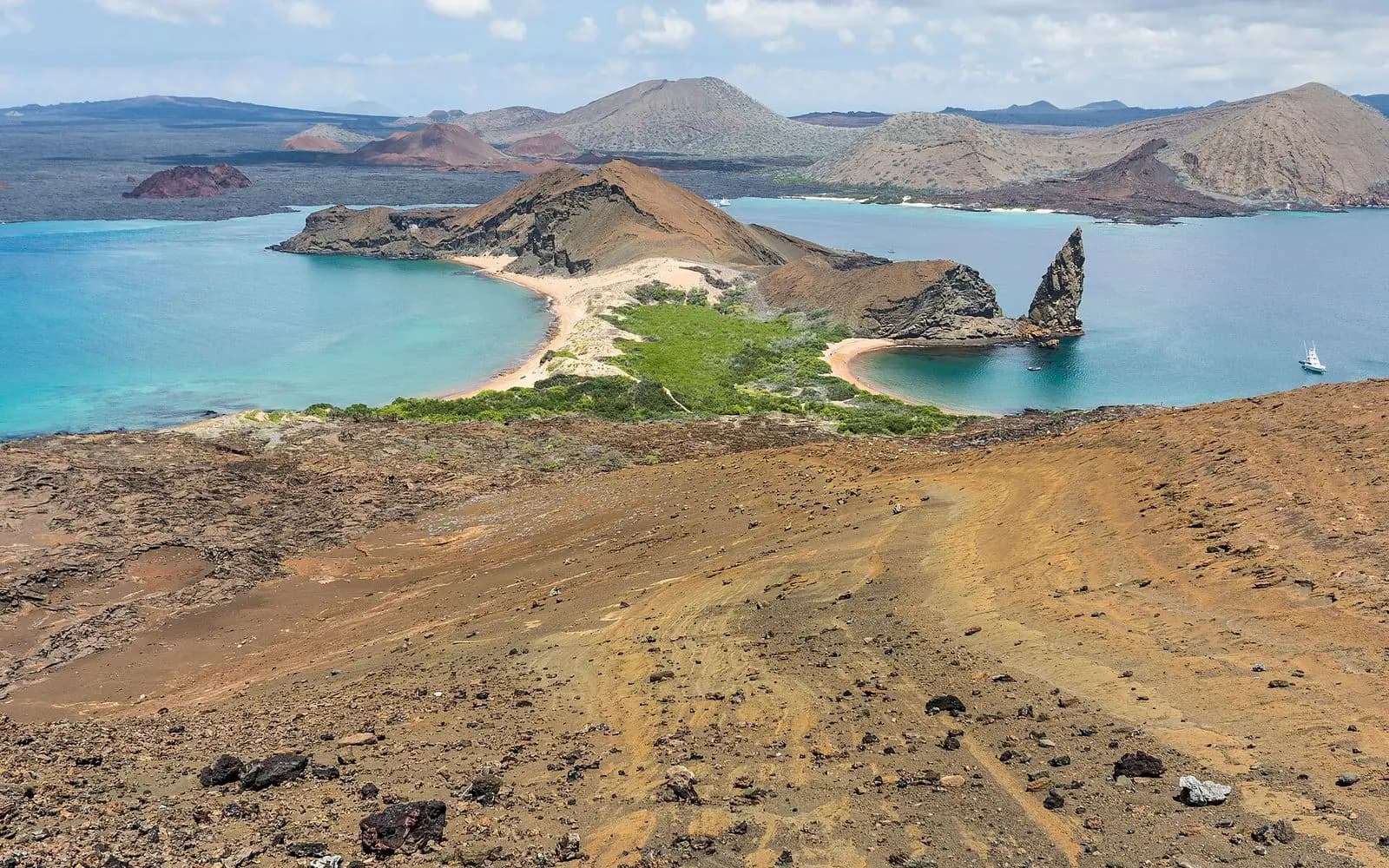 Pinnacle Rock and the twin turquoise bays of Bartolomé Island from the summit, Galápagos, Ecuador