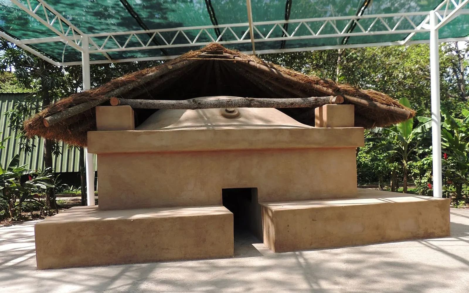 Reconstructed thatched adobe sweat house at the Maya village site of Joya de Cerén, El Salvador