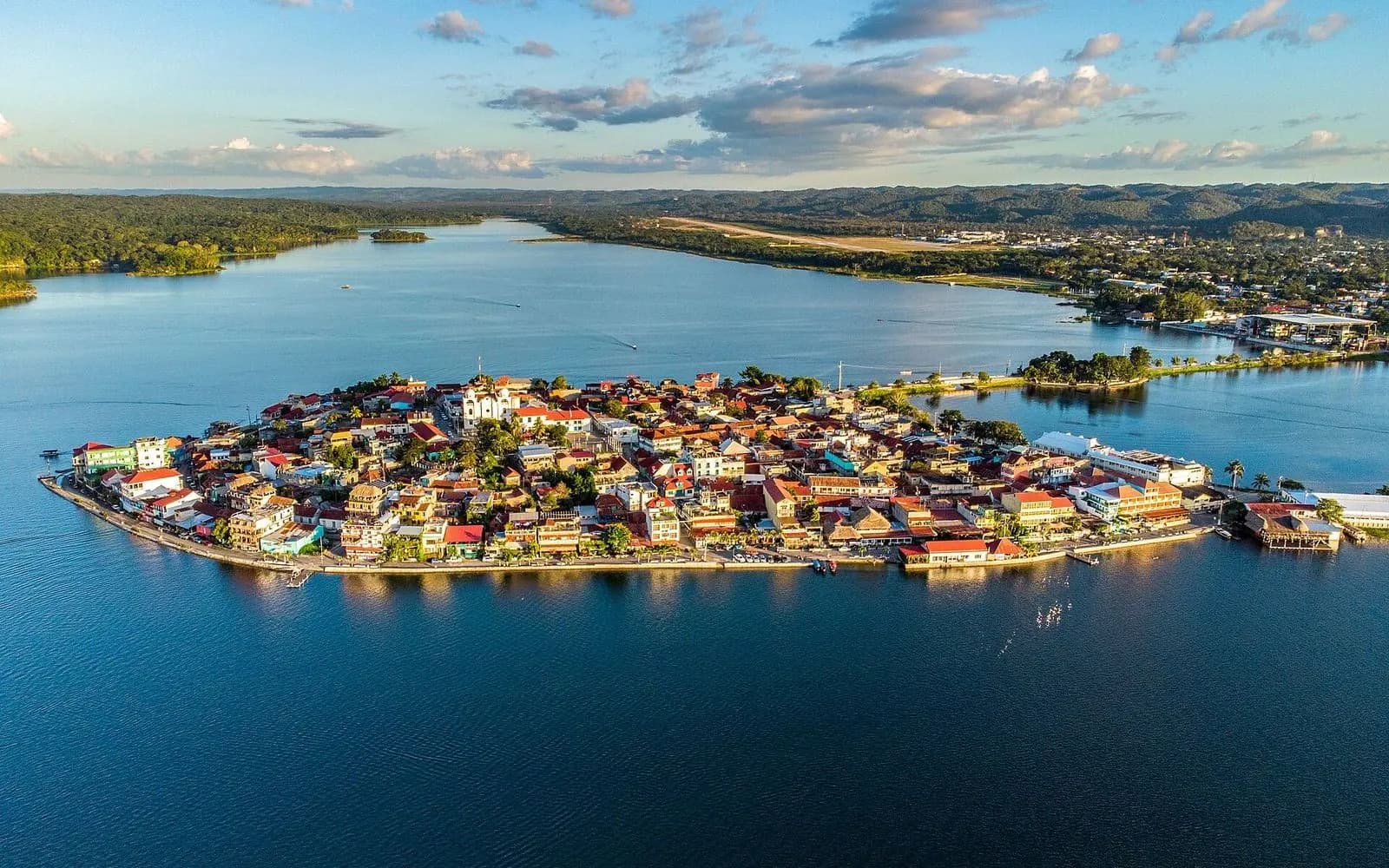Aerial view of the colourful island town on Lake Petén Itzá, Flores, Guatemala