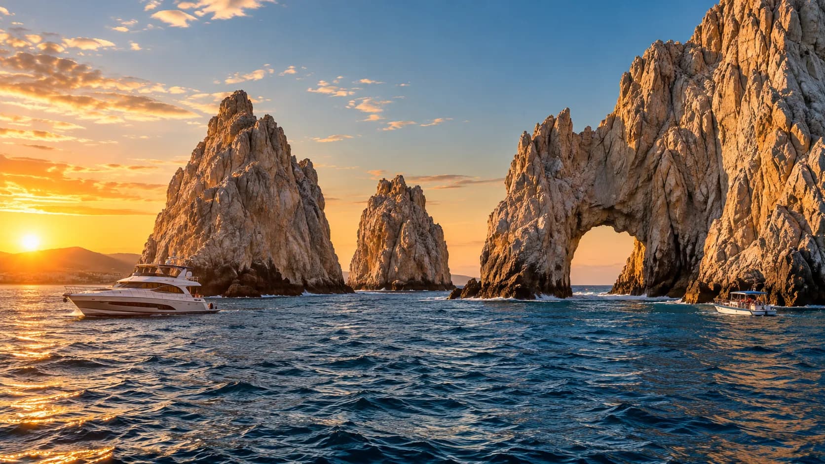 El Arco and the Pacific at sunset off Los Cabos, Mexico